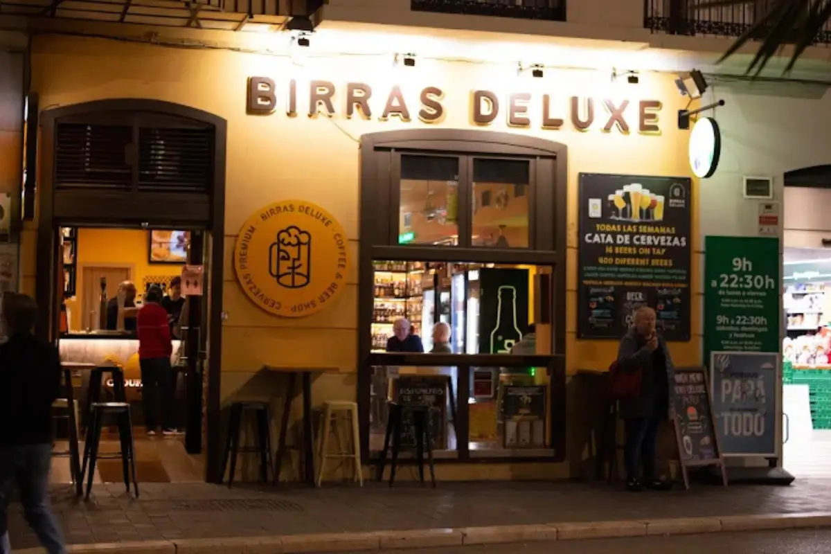 The entrance to Birras Deluxe craft beer bar in Málaga Old Town