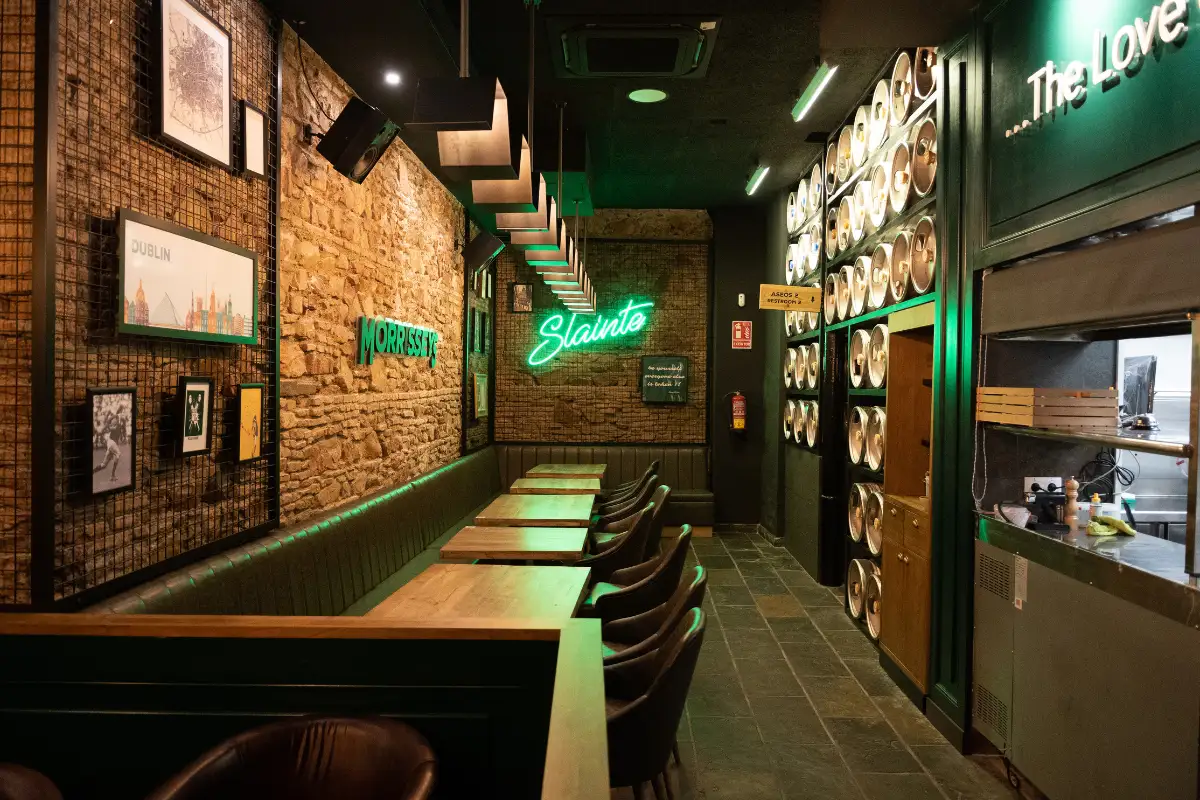 A row of bar stools inside Morrisseys Irish pub in Málaga old town