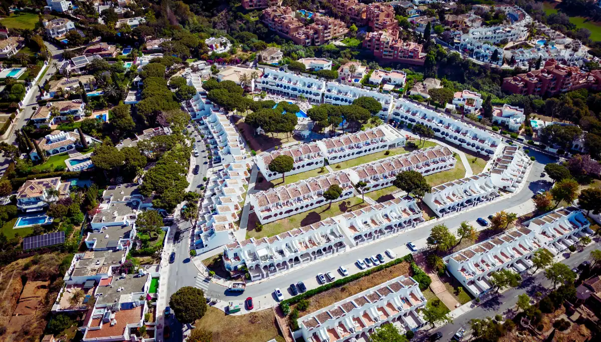 Aerial view of villas and apartment blocks spread across Marbella