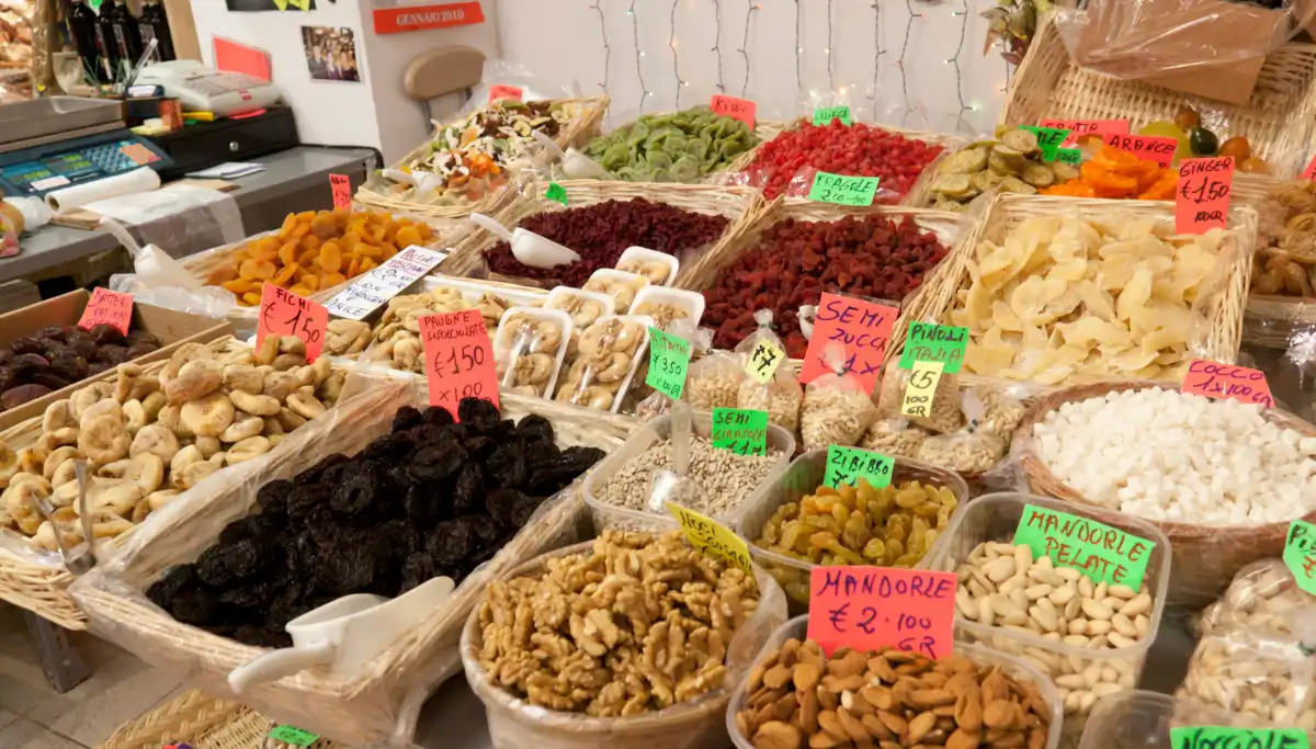 Dried fruit and spice stall inside the Mercado de Triana