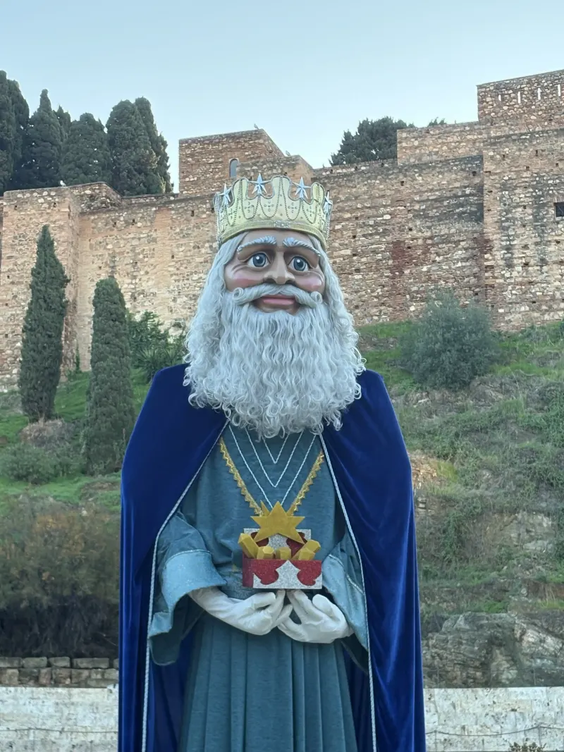 Float depicting a robed king during the Three Kings parade in Málaga