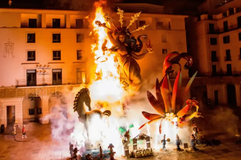 Bonfires on the beach during the Hogueras de San Juan midsummer festival in Spain