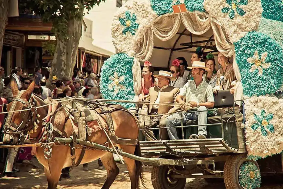 Flower-decorated wagon in a procession at El Rocio pilgrimage in Huelva, Andalusia