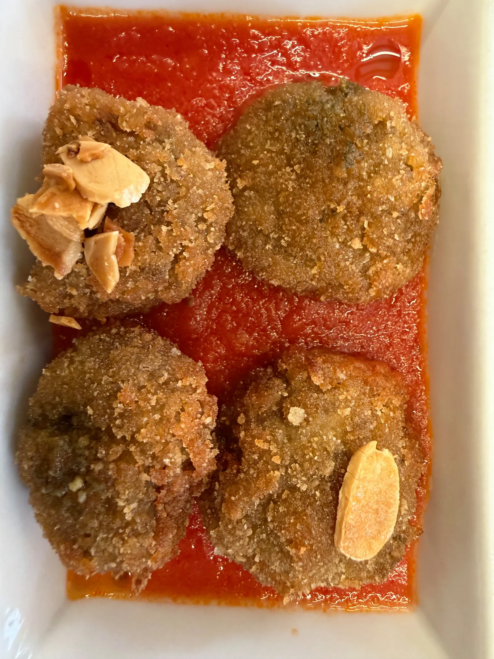 A plate of albóndigas (meatball) tapas at a bar in Antequera