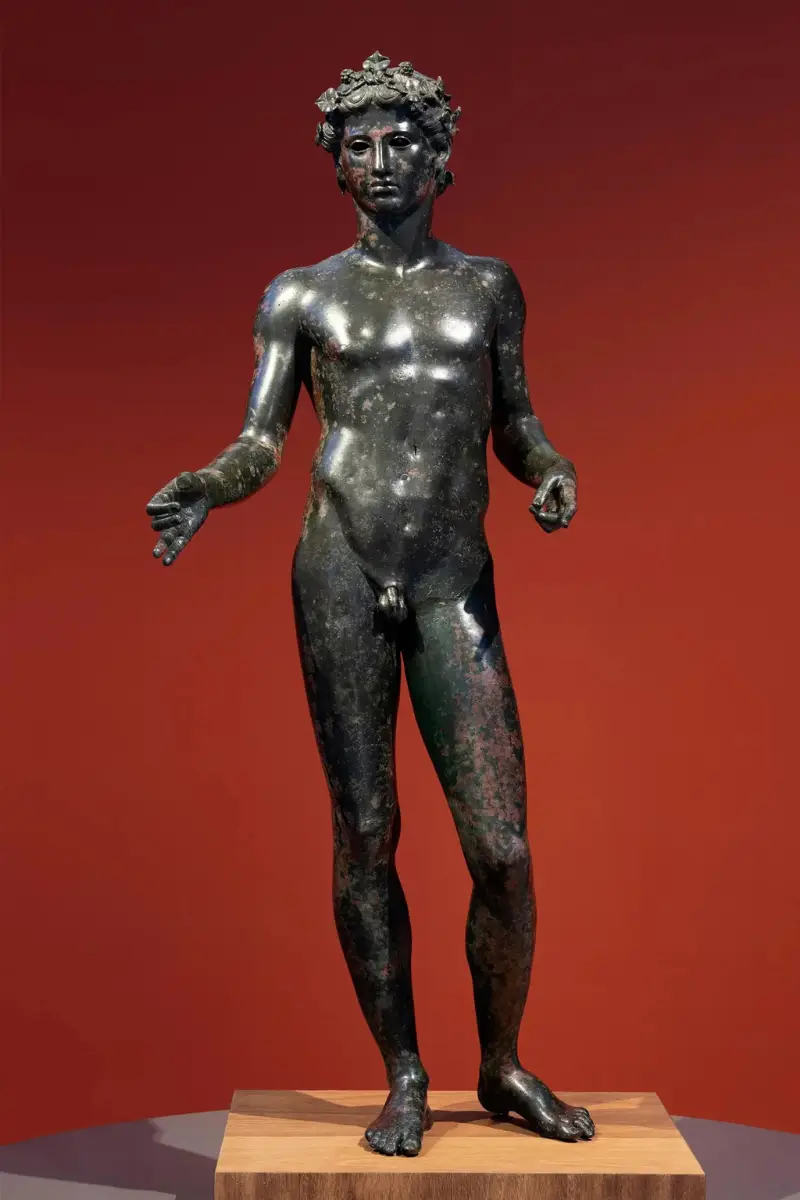 Bronze statue of the Efebo de Antequera on display at the Municipal Museum