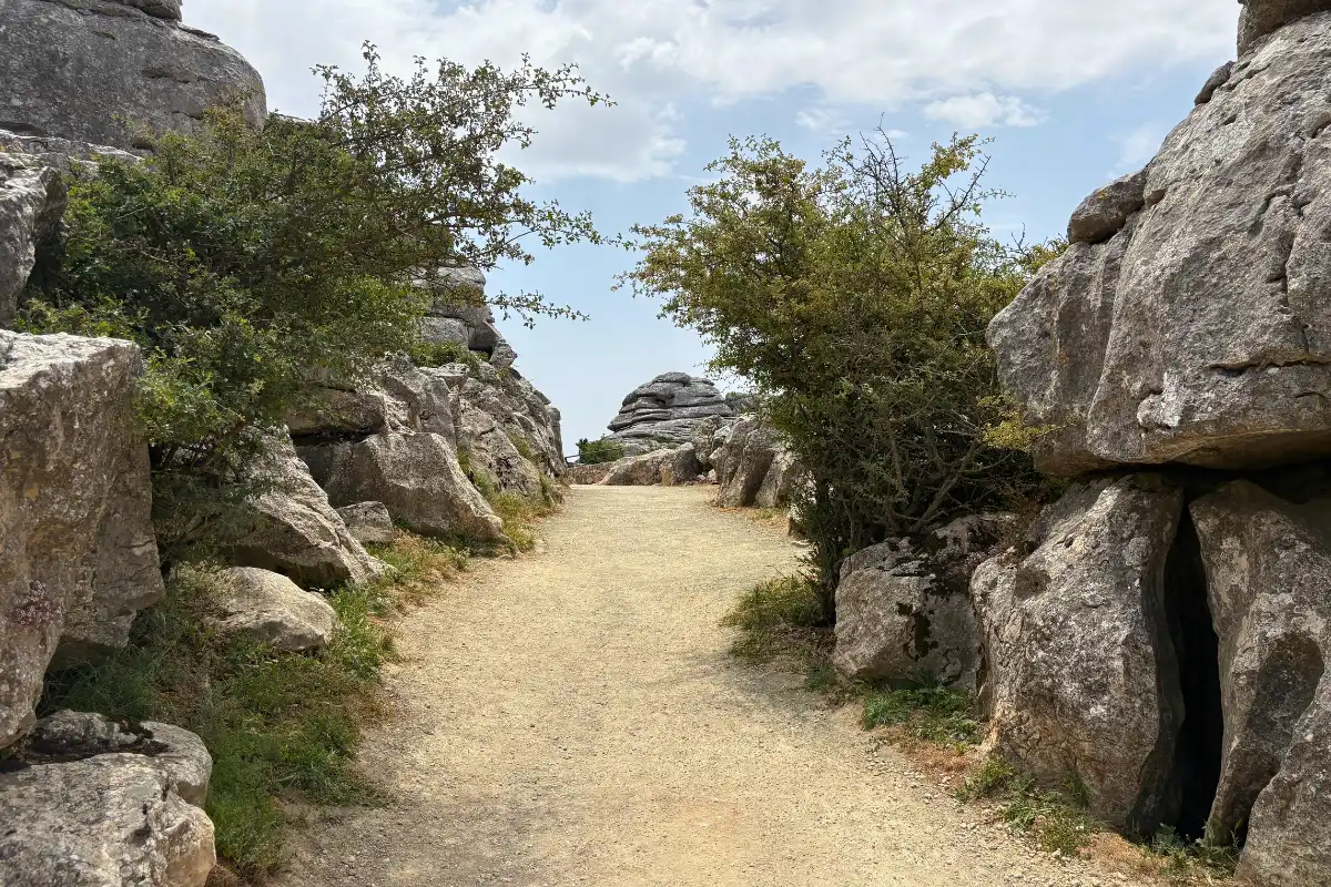 Images of the rock formation with a path in the middle at torcal national park.
