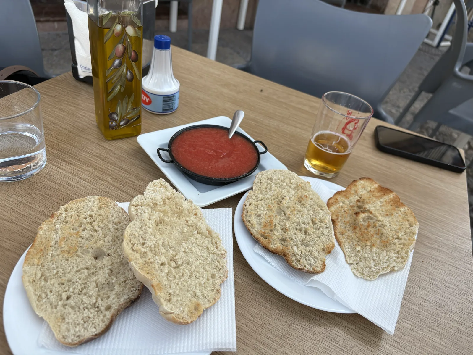 A traditional Antequera breakfast of molletes with grated tomato and olive oil
