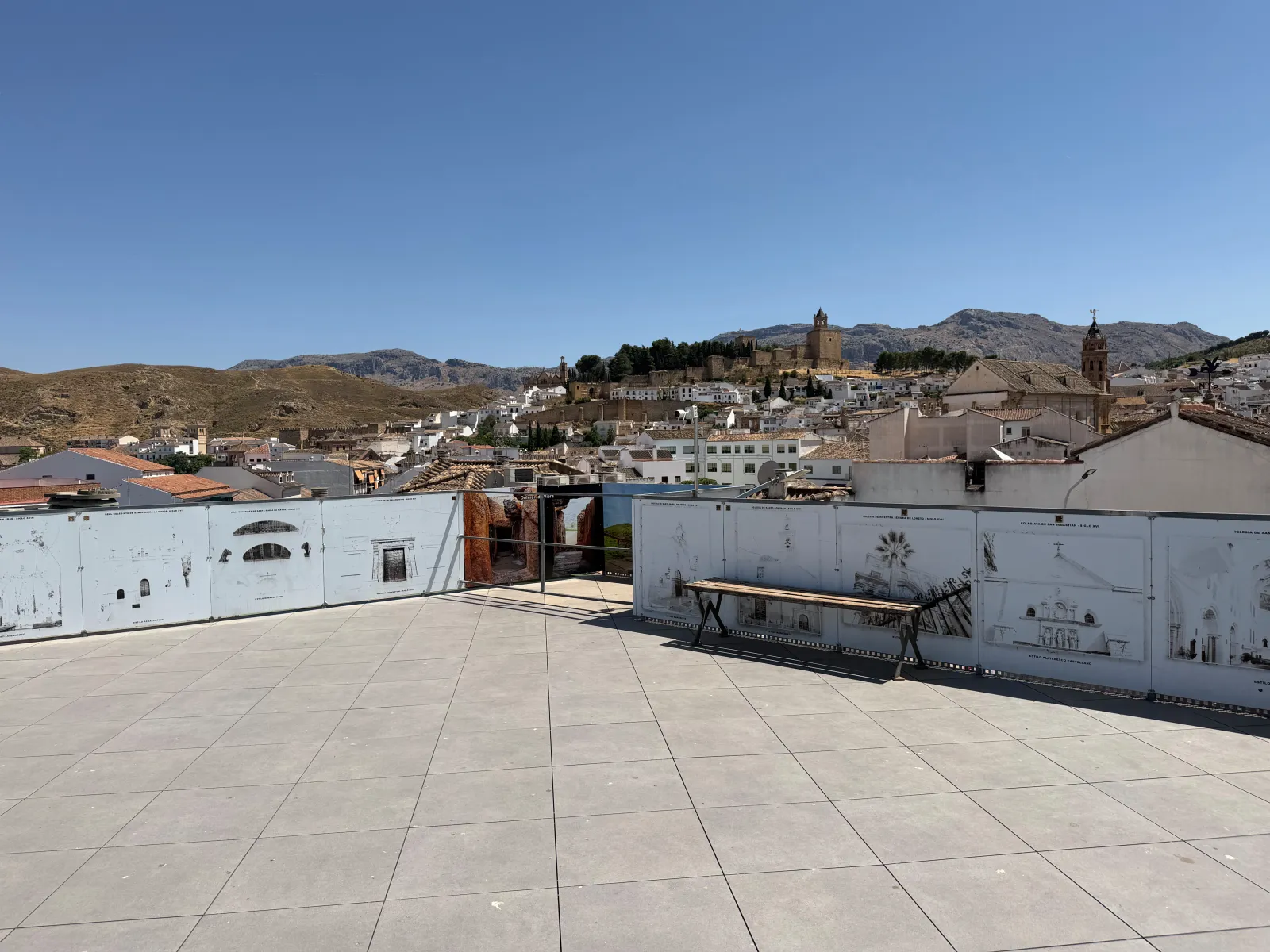 The free rooftop terrace above Parking Centro in Antequera, looking across the white town to the Alcazaba on its hill