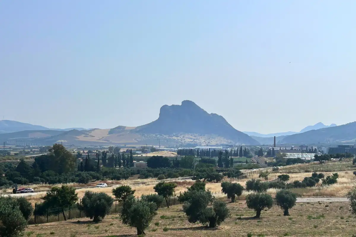The Peña de los Enamorados rock formation rising above olive groves outside Antequera