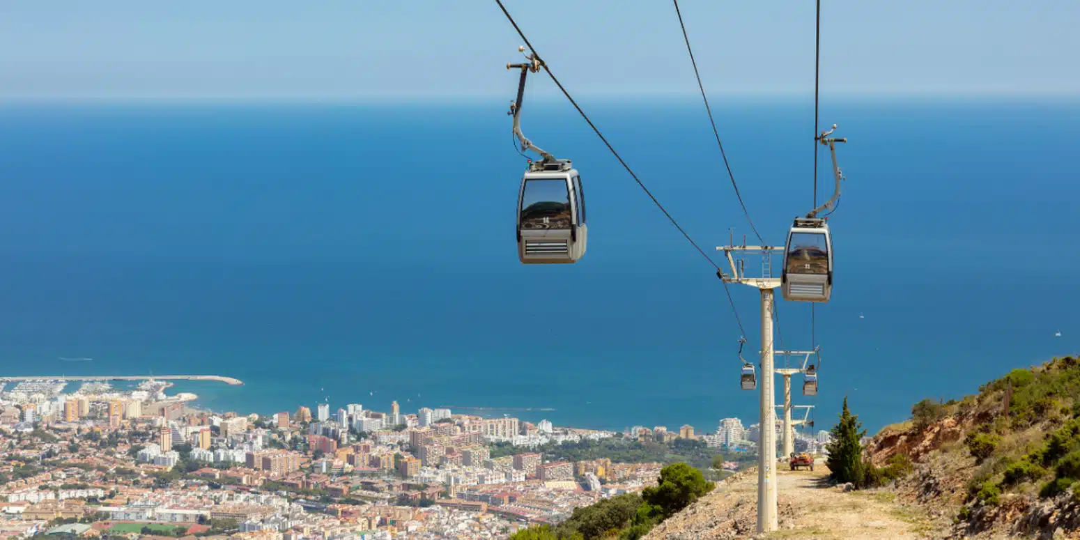 Cable cars above the cliffs of Benalmadena on the way to Mount Calamorro