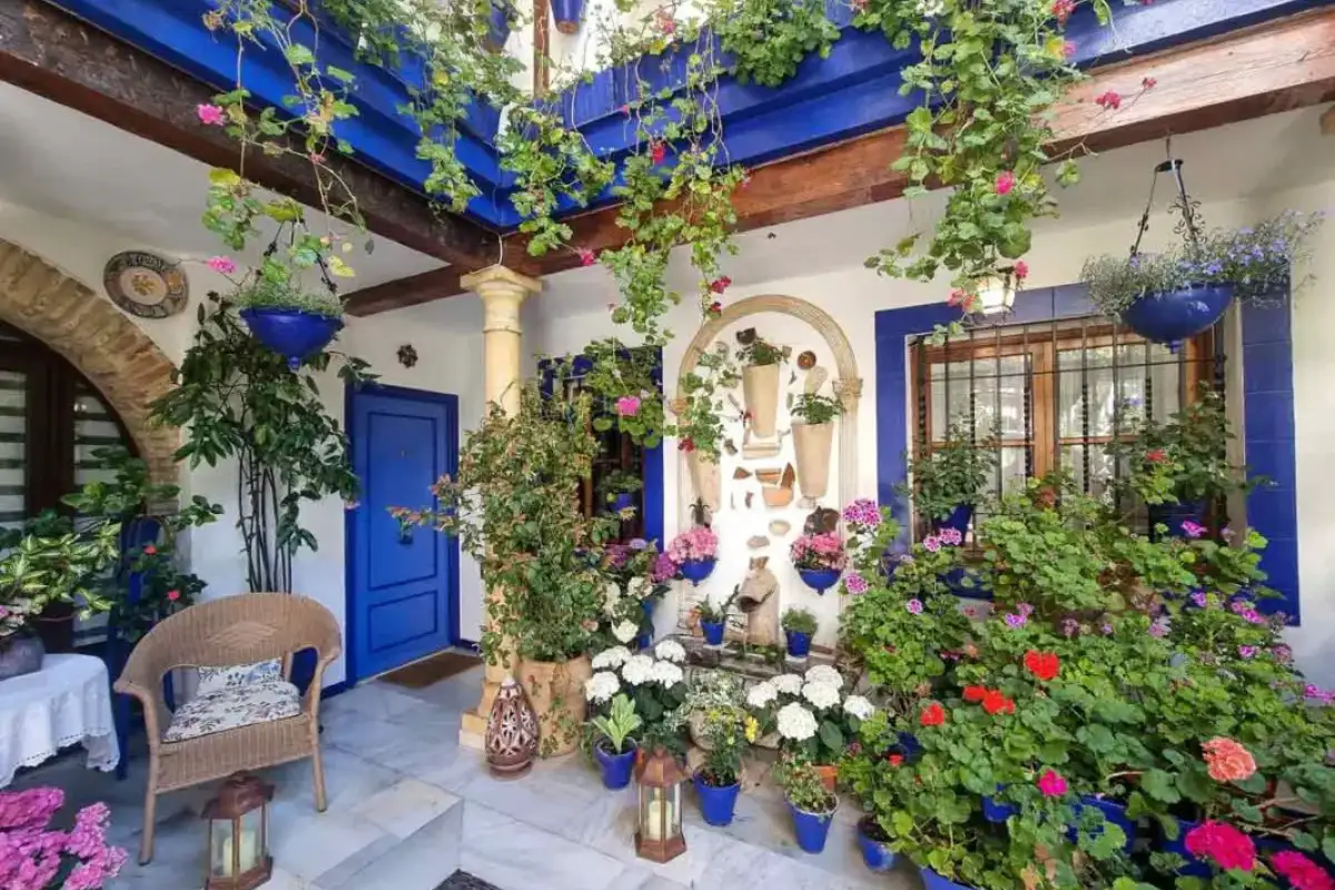 Floral patio decorated with geraniums and jasmine in Jerez de la Frontera