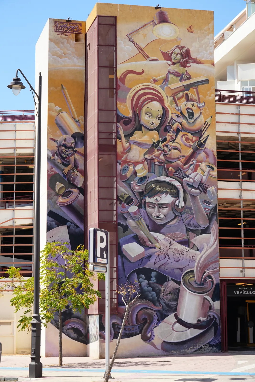 Comic-style Lobo mural on a multi-storey car park in Estepona