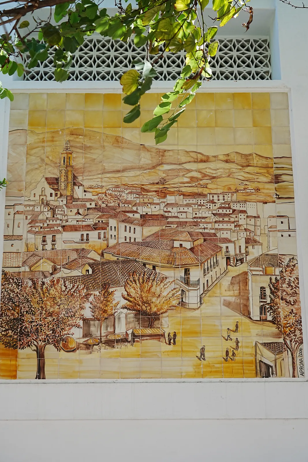 Ceramic tile mural of an Andalusian hillside village in Estepona