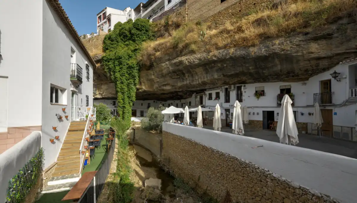 Houses and bars built under giant rock overhangs in Setenil de las Bodegas