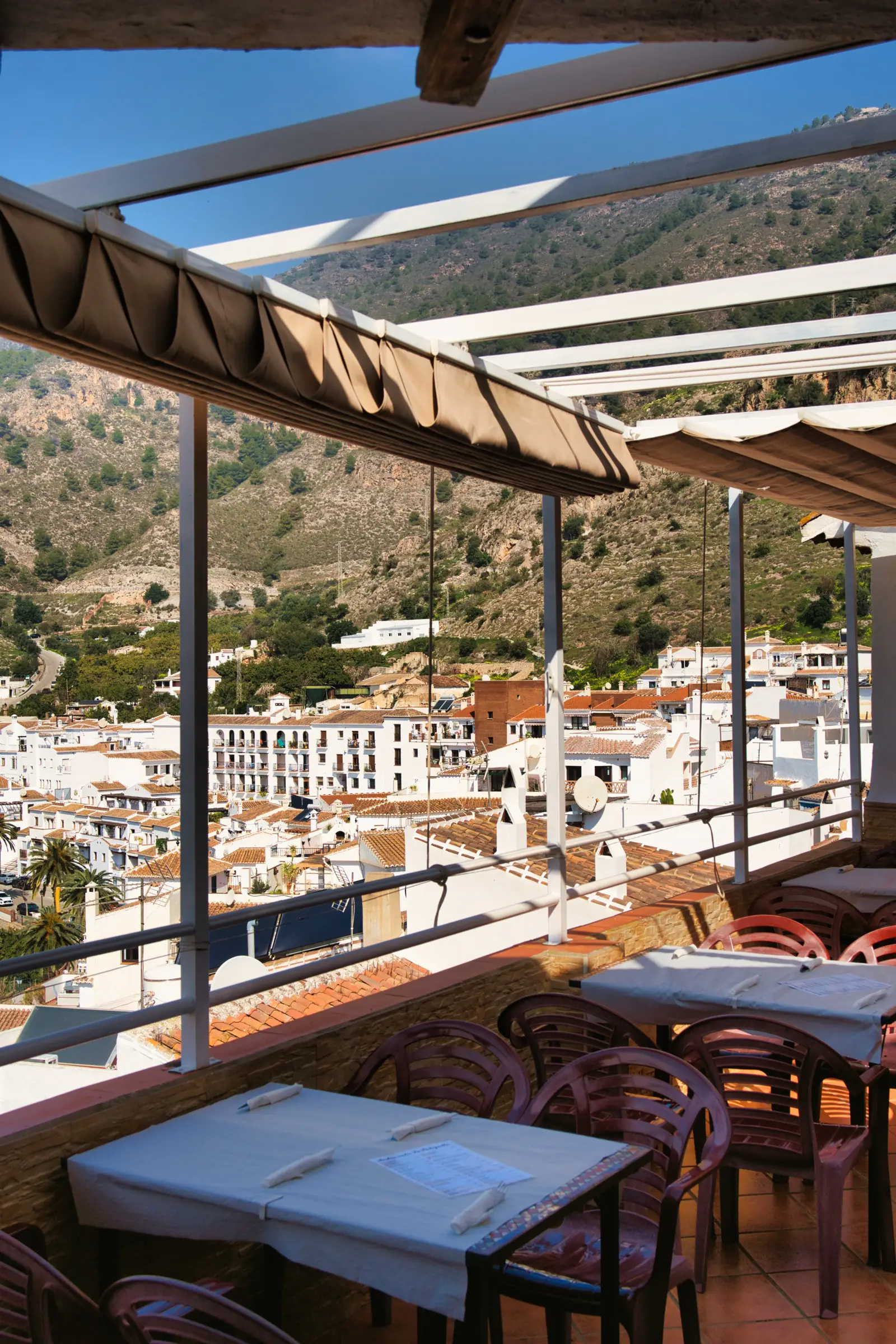 La Bodeguilla's terrace tables looking out over the Frigiliana valley