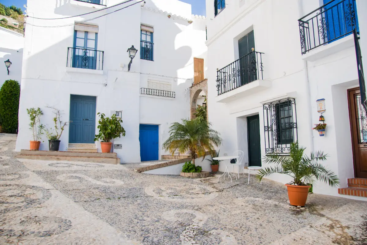Whitewashed streets of Frigiliana village, a popular day trip from Nerja