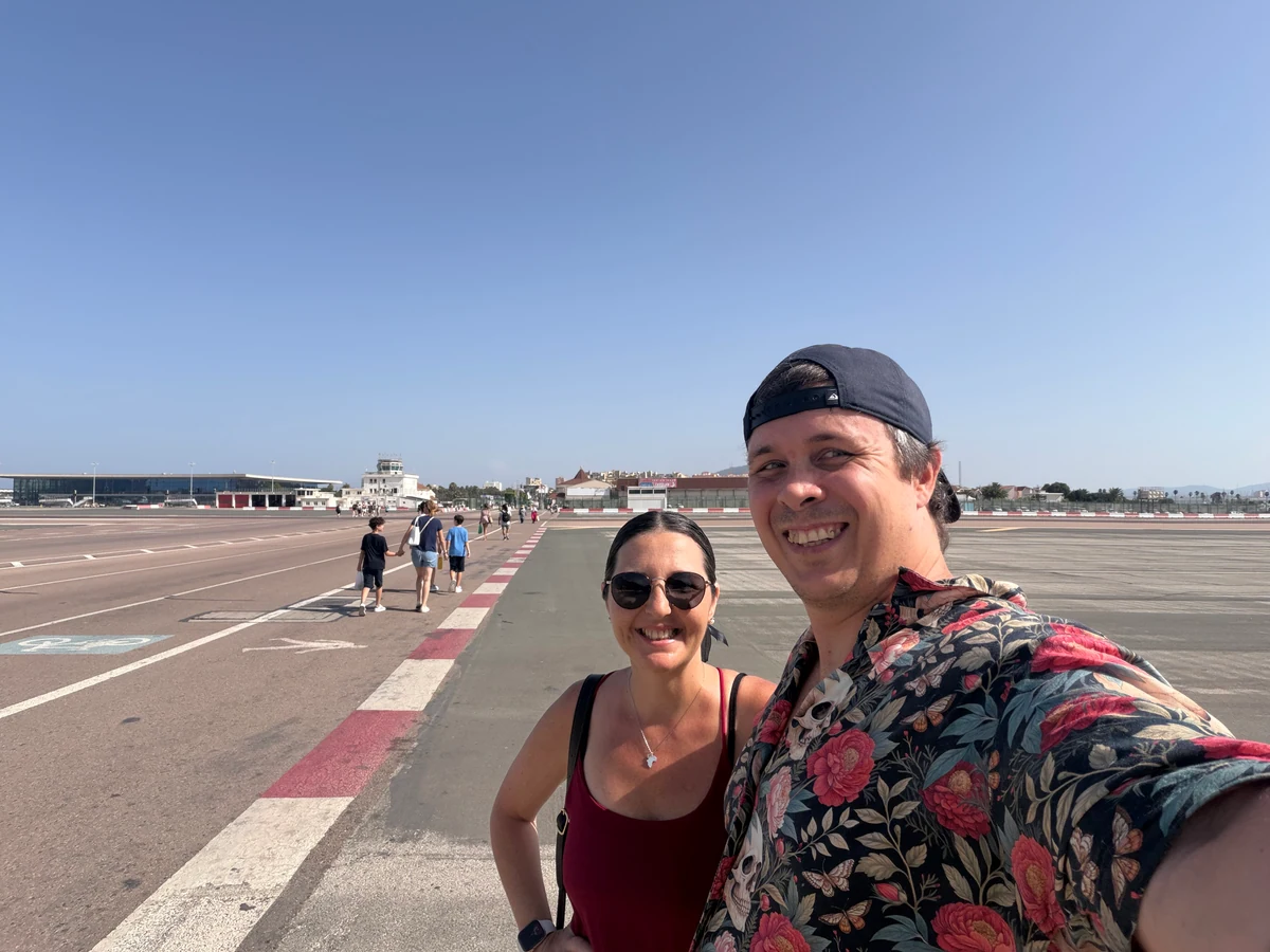 Standing beside the runway at Gibraltar airport waiting for an aircraft