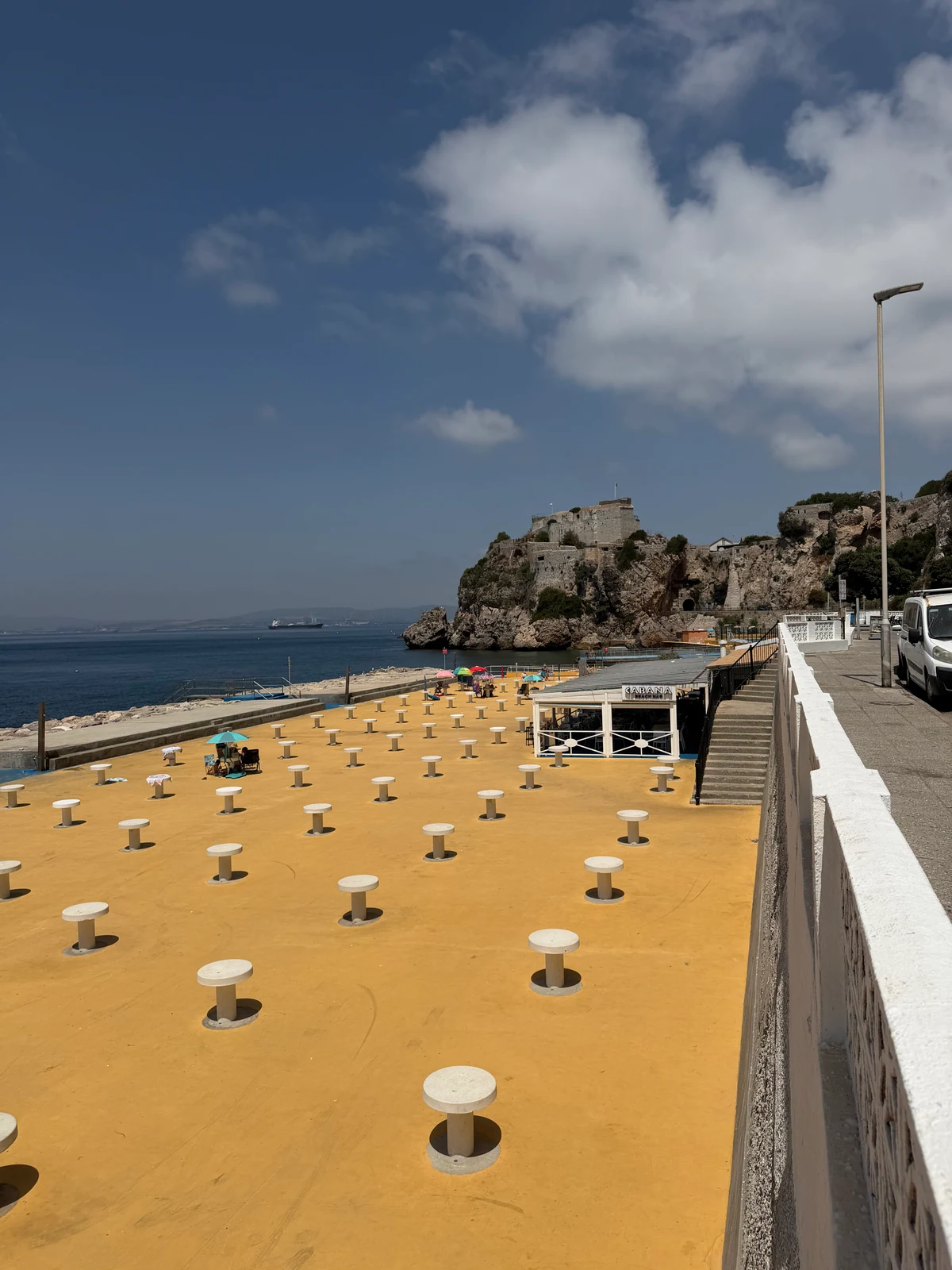 Yellow sun terrace and swimming lido at Camp Bay, Gibraltar