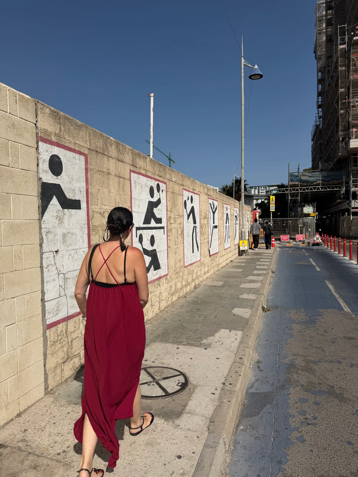 Standing beside the airport hoarding graphics at Gibraltar airport