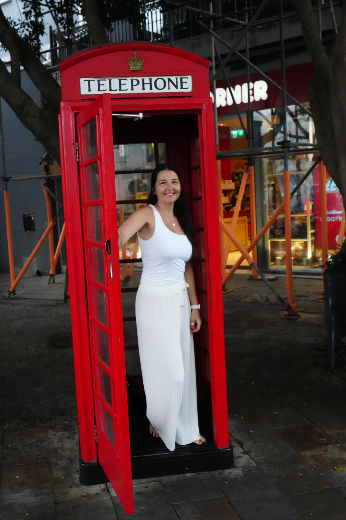 Standing inside a red telephone box in Gibraltar