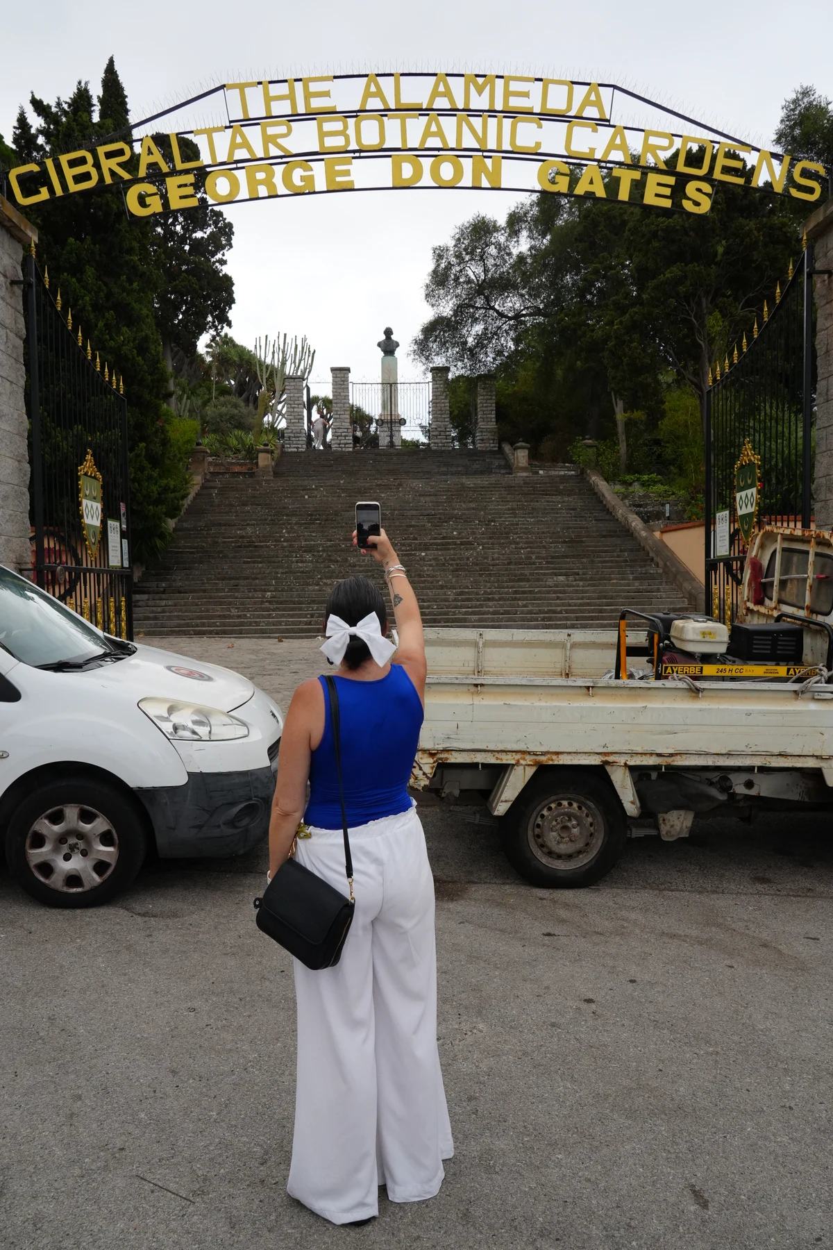Heidi photographing the Alameda Botanic Gardens gates in Gibraltar