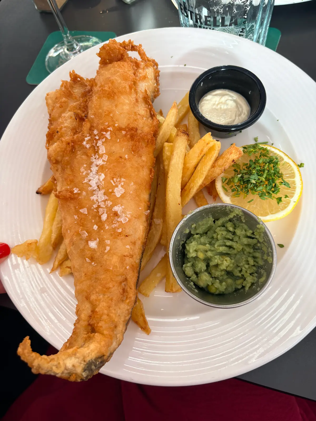 Battered fish and chips with mushy peas, tartare sauce and lemon at The Little Rock in Gibraltar
