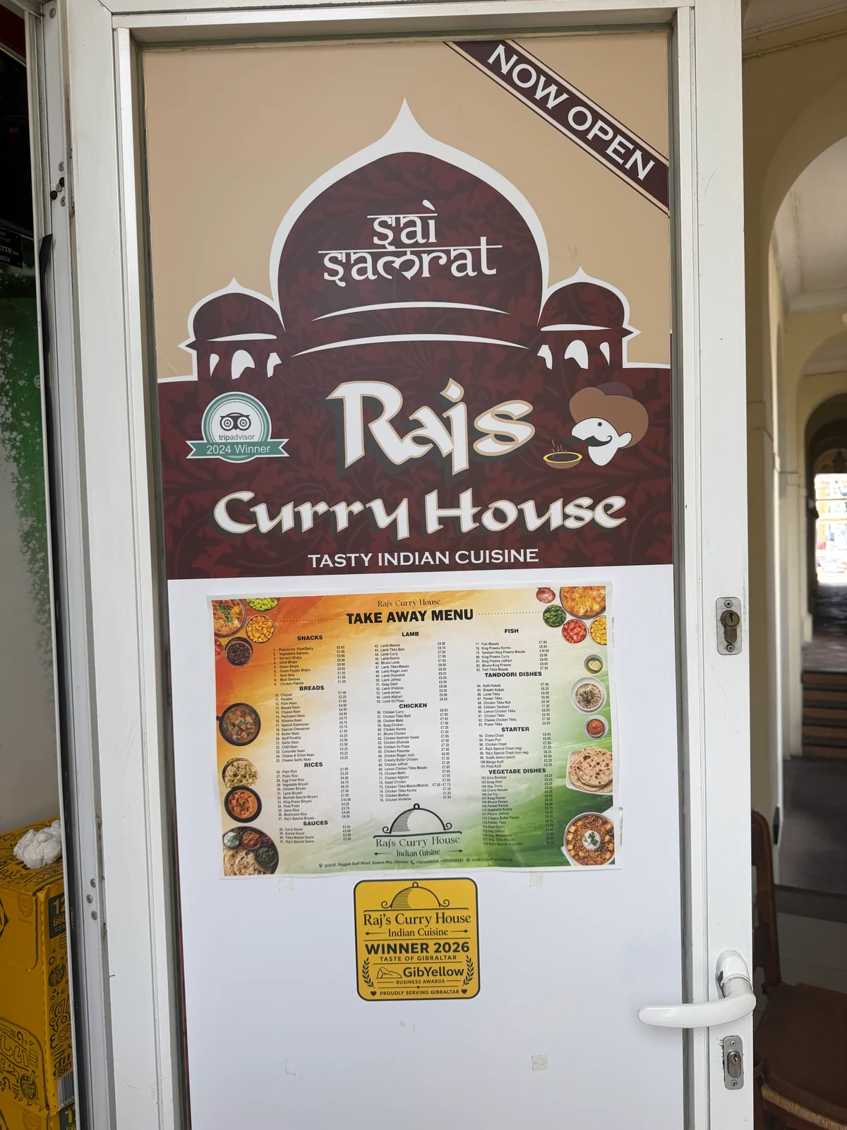 Takeaway menu outside Raj's curry house in Gibraltar
