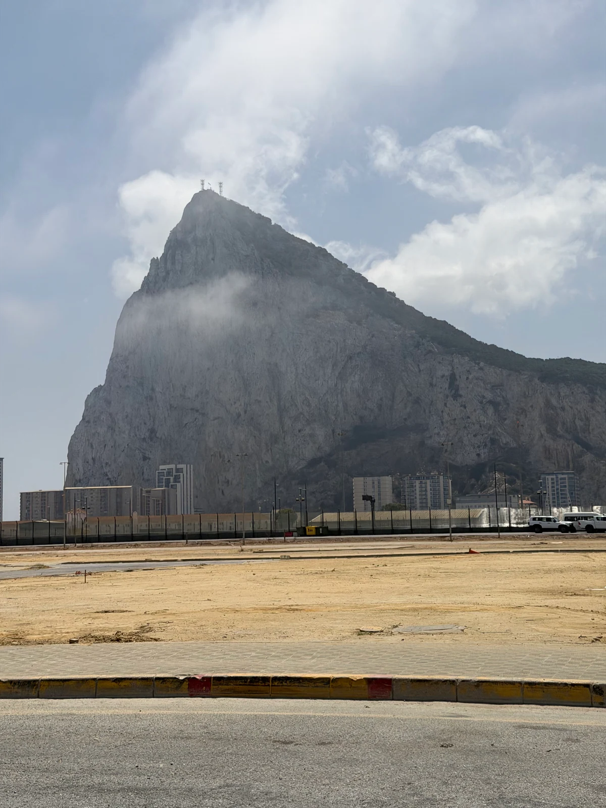 The Rock of Gibraltar seen from the isthmus with levante cloud sitting on the summit