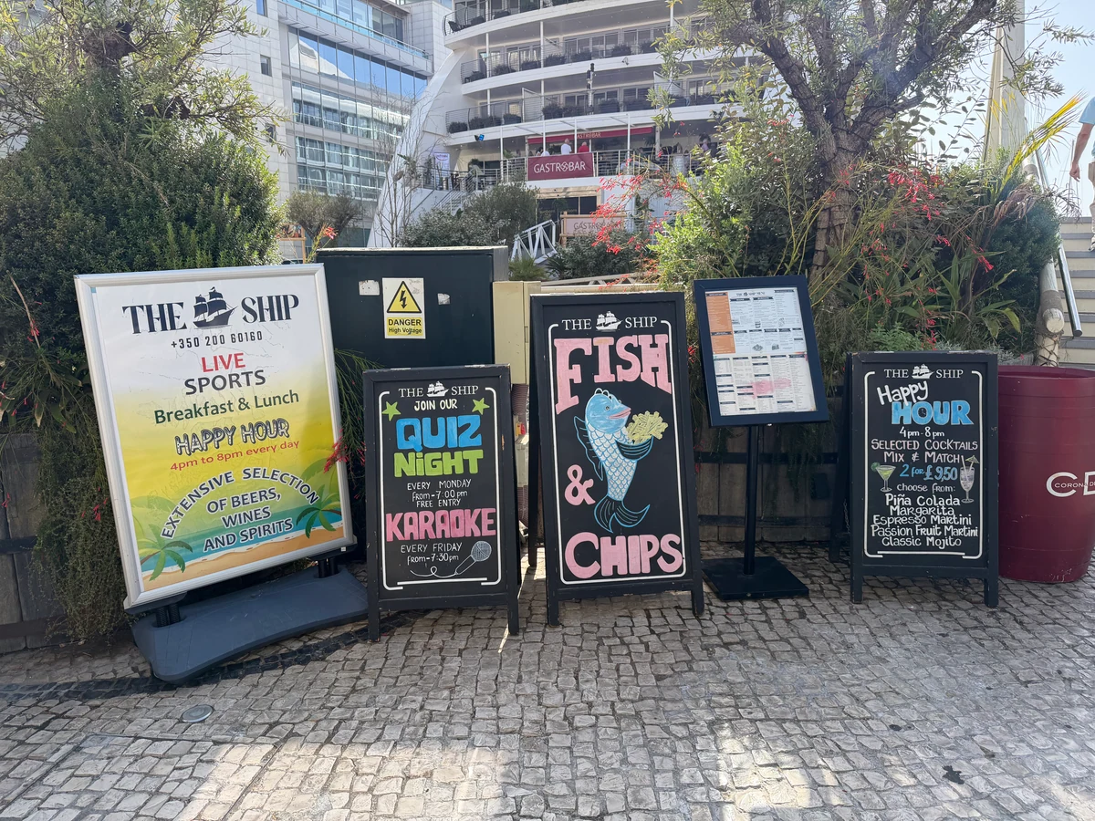 Fish and chips blackboards outside a pub in Gibraltar