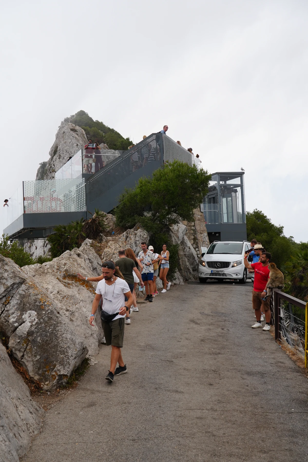 Visitors queuing for minibuses at the Gibraltar Skywalk