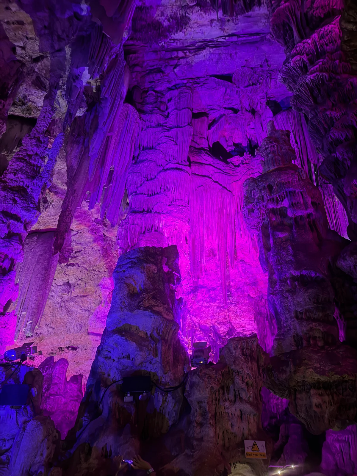 Purple lit chamber inside St Michael's Cave, Gibraltar