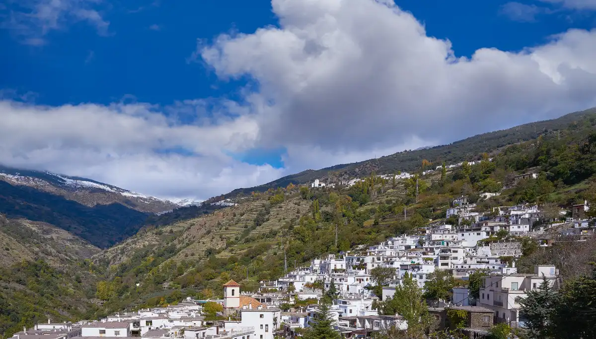 Flat-roofed Alpujarras village clinging to a steep hillside south of Granada