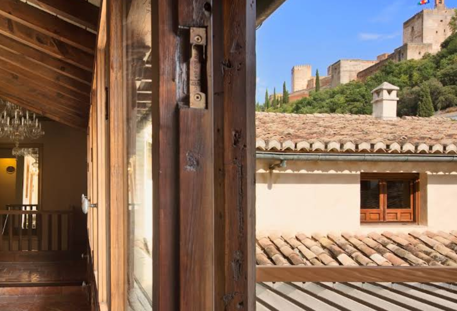 Casa 1800 Granada boutique hotel with rooftop terrace overlooking the Alhambra