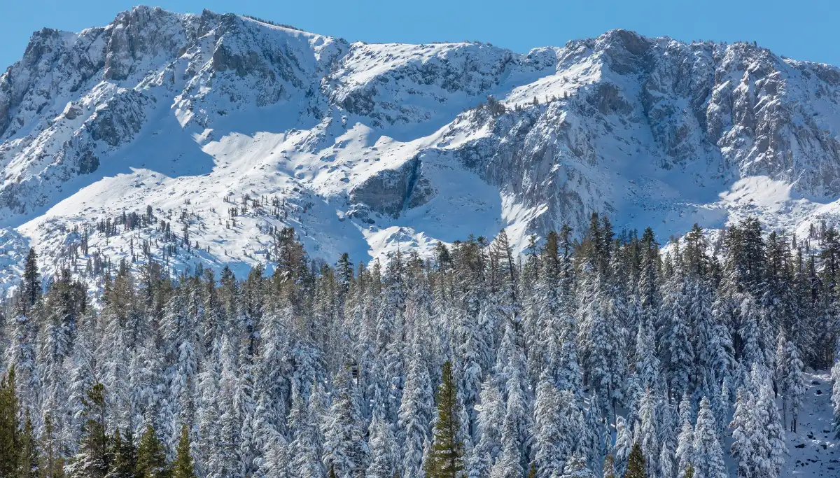 Snow-covered Sierra Nevada peaks above Granada with ski resort slopes