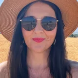 Heidi Hein in a straw hat and sunglasses