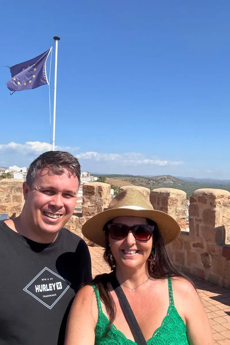 Couple on the ramparts of Burgalimar Castle in Baños de la Encina