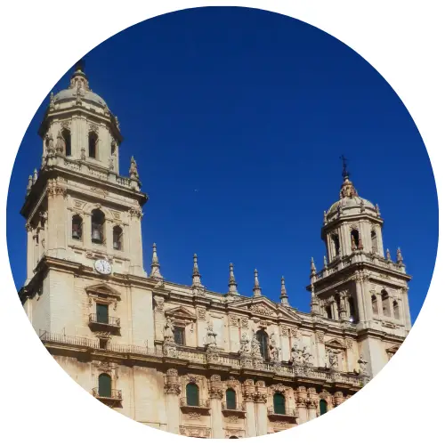 Baroque twin towers of Jaén Cathedral facade against a clear sky