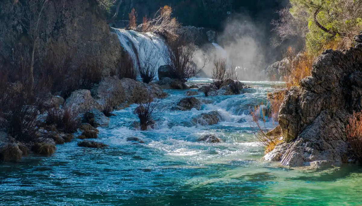Turquoise river and waterfall in the Sierra de Cazorla natural park