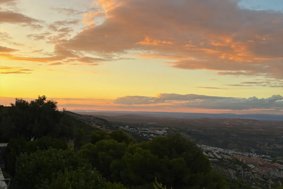 Sunset over the olive groves and valley seen from the castle ridge above Jaén
