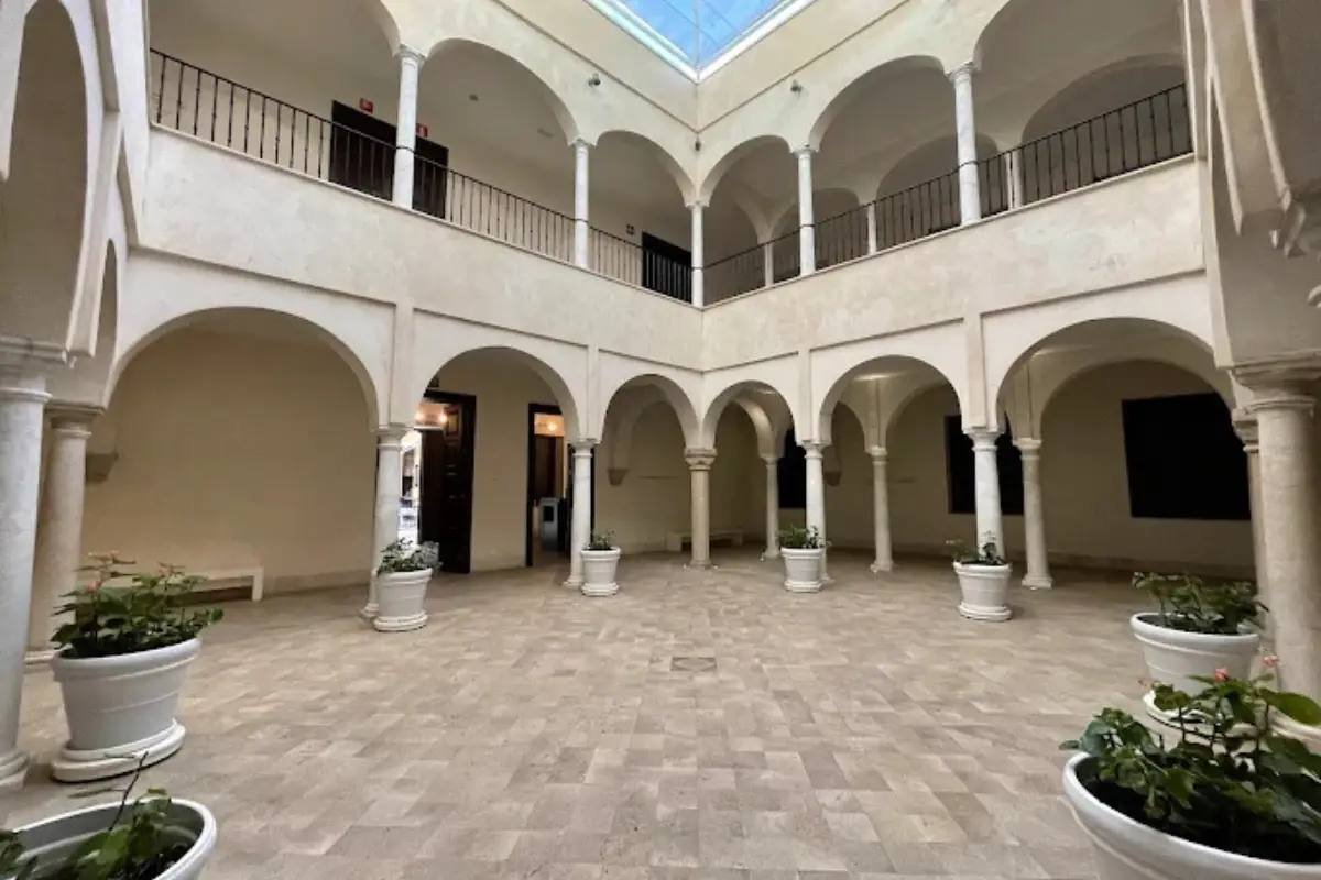 The empty courtyard with curving entrances at the Carmen Thyssen Museum in Malaga.