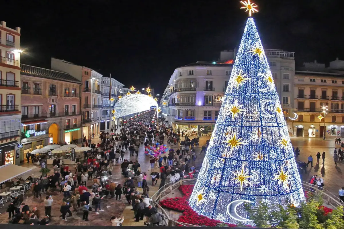 Glowing Christmas tree in the centre of Calle Larios in Malaga.