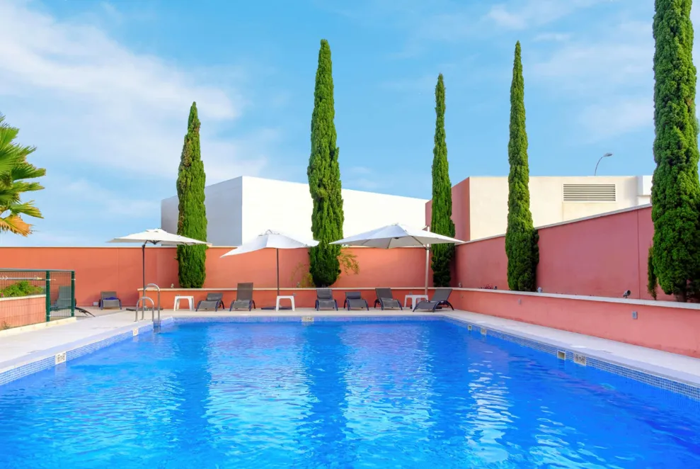 Hilton Garden Inn Malaga pool area close to the airport and metro
