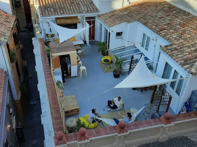 Rooftop terrace at Urban Jungle Hostel in Malaga's old town