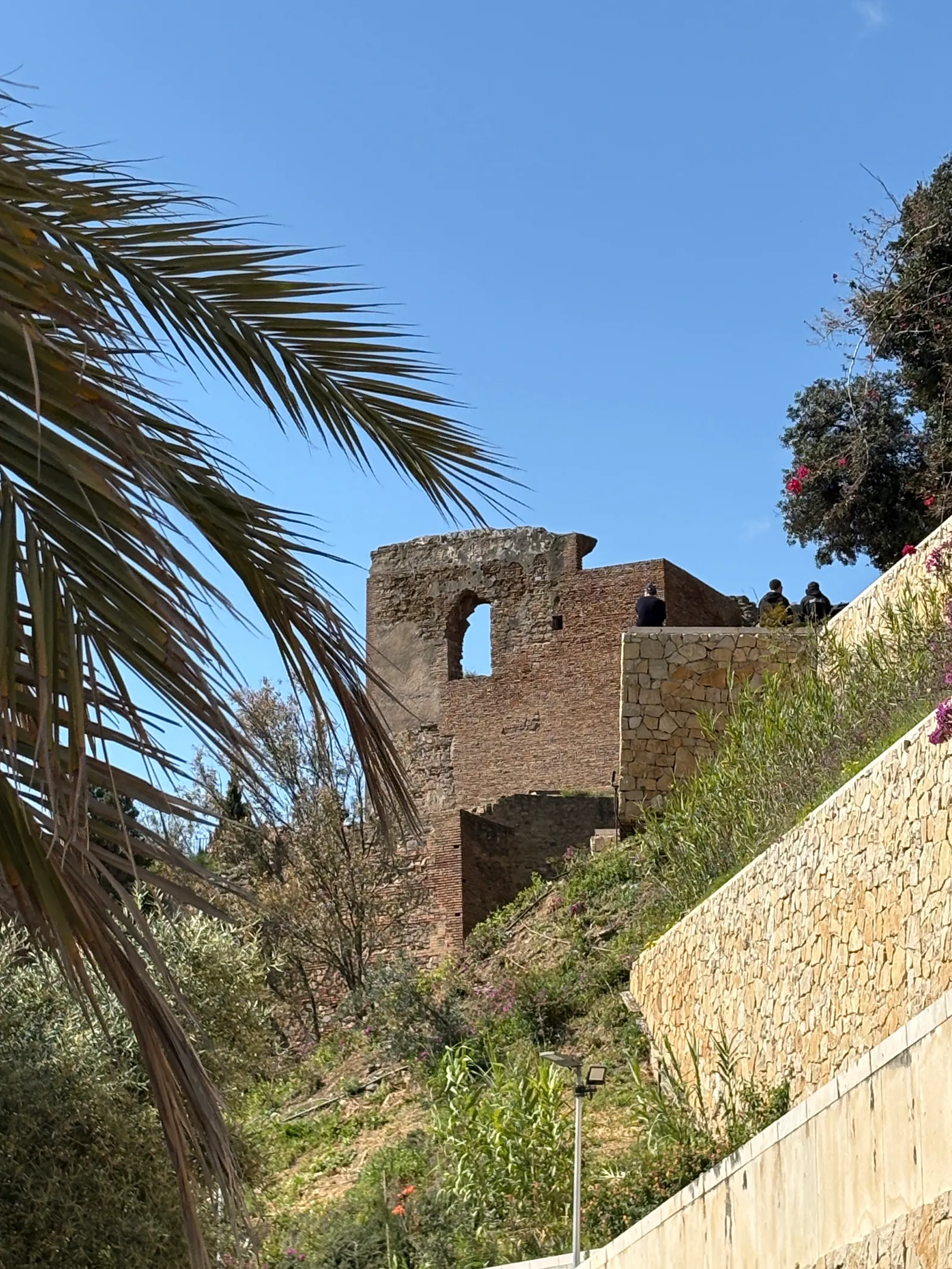 Moorish archways and gardens inside the Alcazaba fortress in Malaga