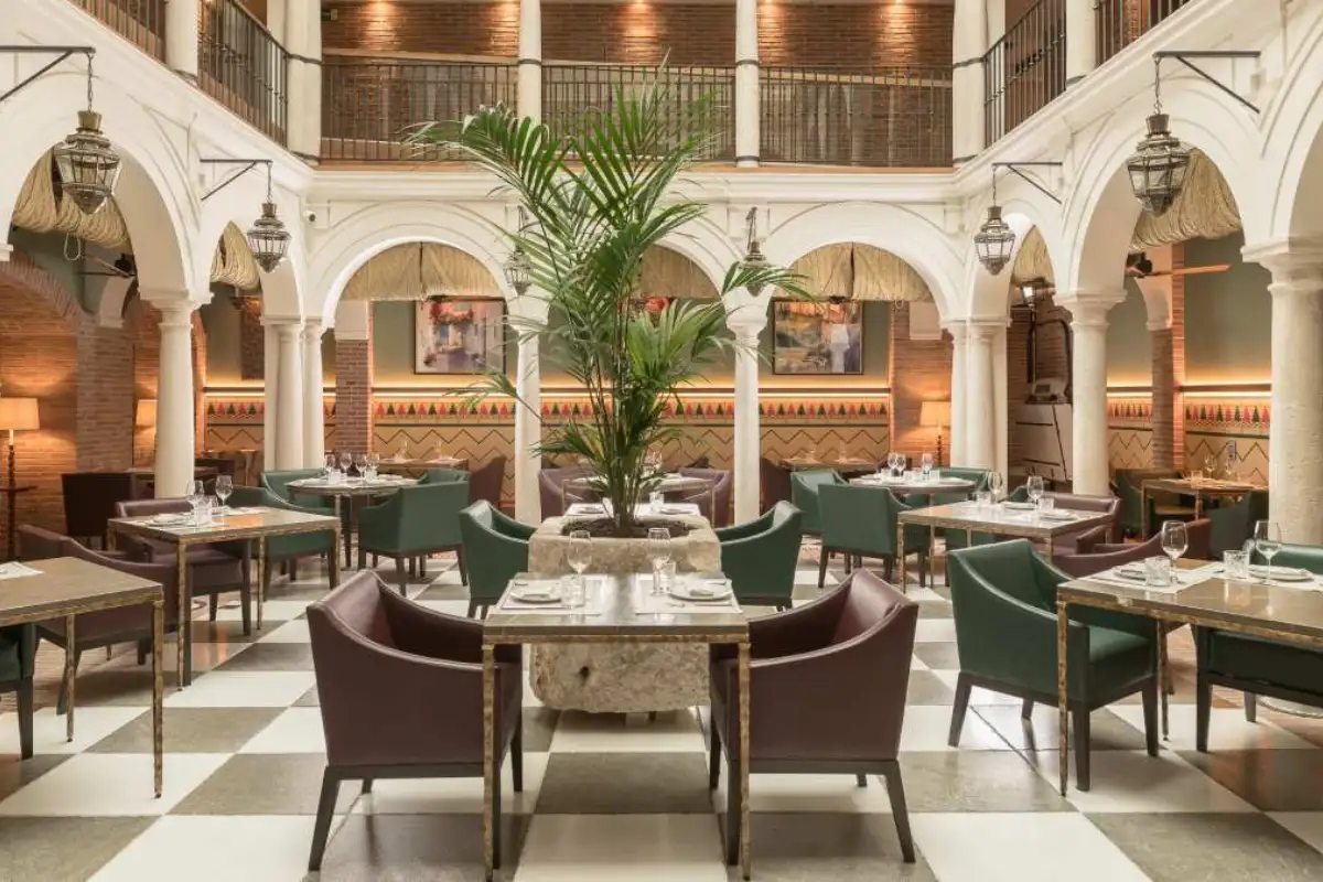 Elegant dining room at Balausta restaurant in Malaga, one of the city's most romantic restaurants
