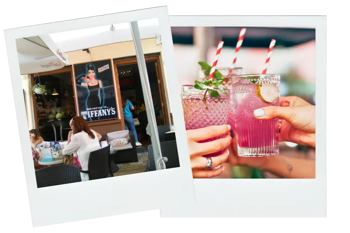 Diners clinking glasses under the awning at Breakfast at Tiffany's Málaga