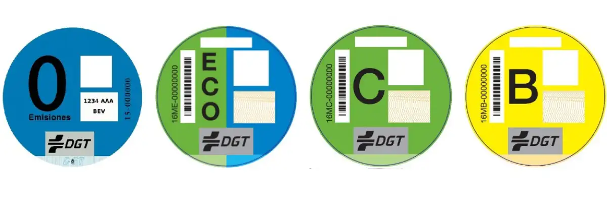 The four DGT environmental label stickers used in Spain