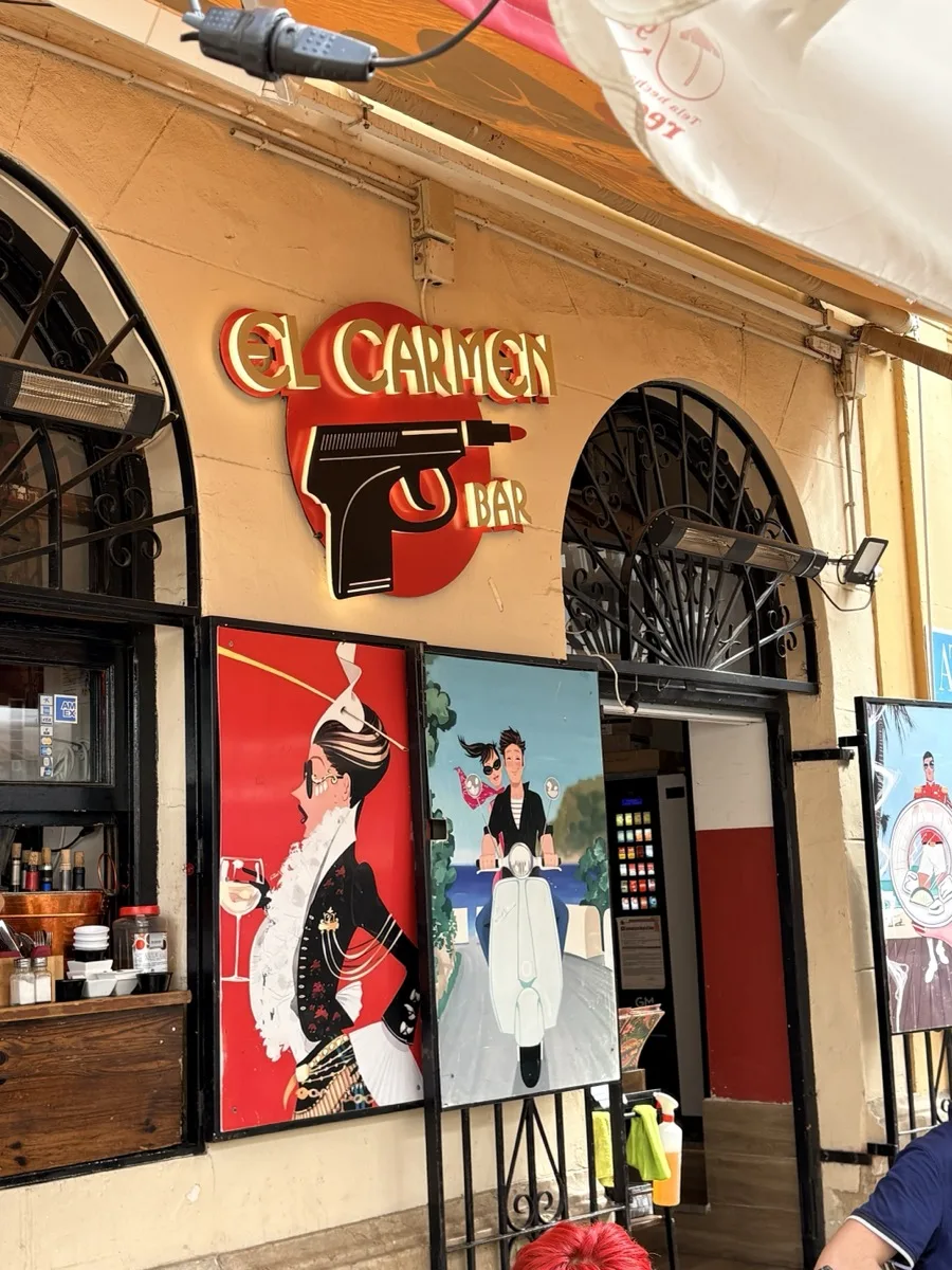 The El Carmen Bar sign in Málaga, on Plaza de la Merced next to Rita's Resto Bar