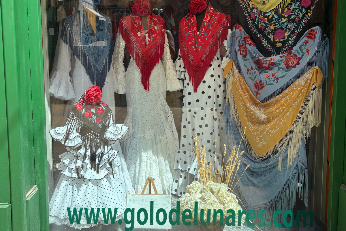 Flamenco dresses on display in a Málaga shop window
