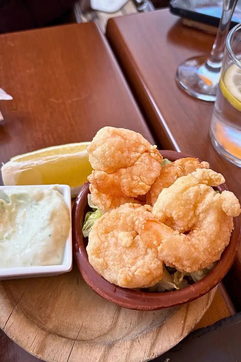 Golden crispy prawns served as tapas at Picasso Bar Málaga